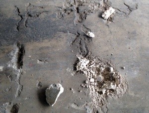 damaged-concrete-slab-in-need-of-a-resurface